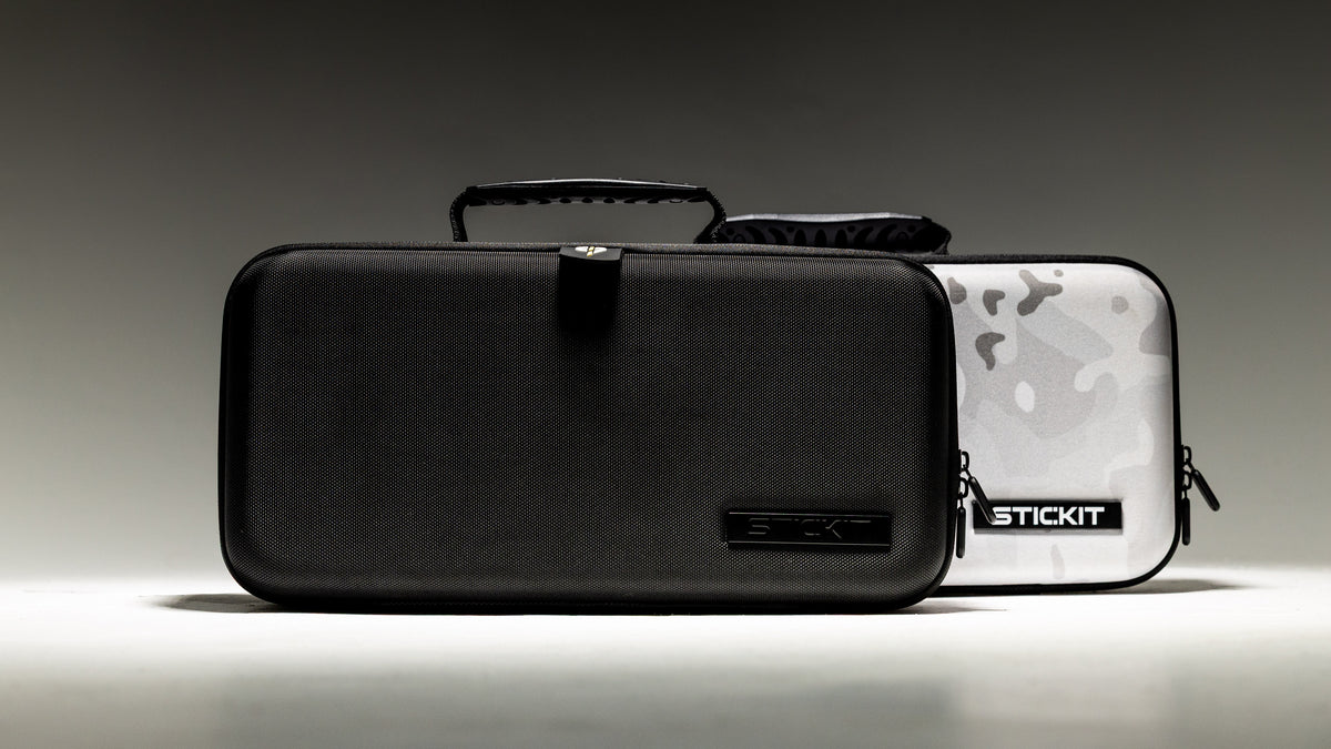 Black and gray textured storage cases, one with logo; perfect for organizing accessories and gear.