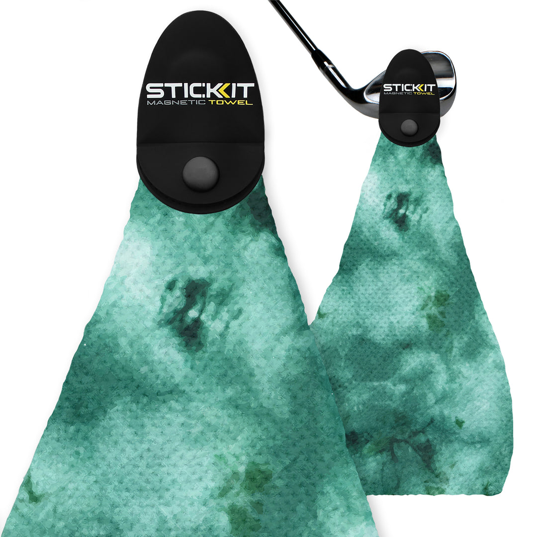 Magnetic golf towels in teal watercolor pattern, featuring durable fabric and a convenient clip for easy attachment.