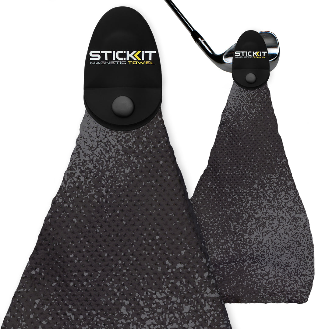 Magnetic black StickIt towel with textured surface, ideal for golfers. Durable, functional design for on-course convenience.