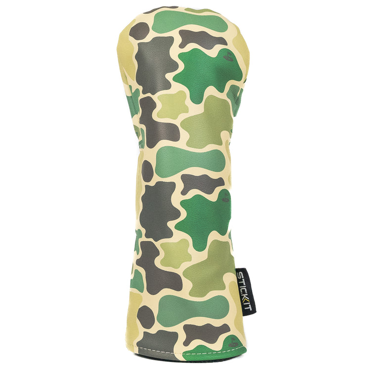Green and beige camouflage golf club headcover in durable synthetic leather, sleek design for protection and style.