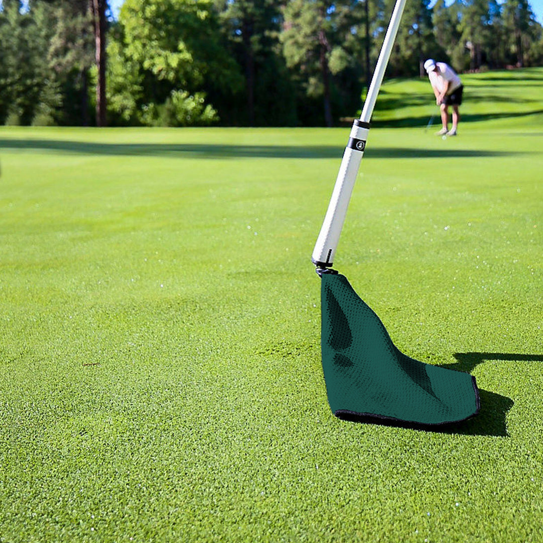 Green golf putting aid, made of durable fabric with a sturdy pole, perfect for improving your short game skills.