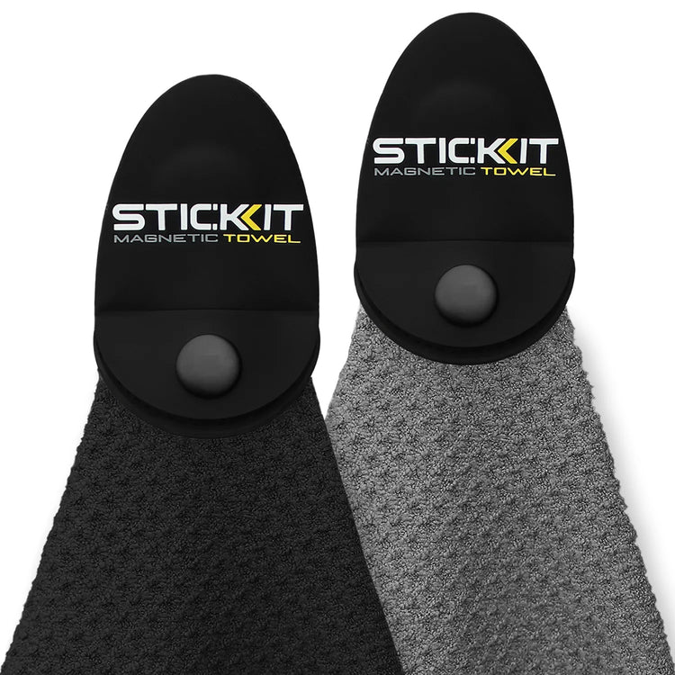 Black and gray magnetic towels with snap buttons, designed for convenience and style in outdoor activities.