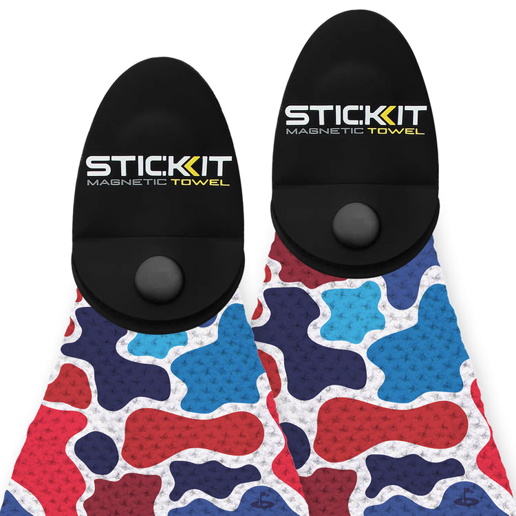 Colorful abstract-patterned magnetic towel in blue, red, and white with a black silicone grip. Ideal for outdoor activities.