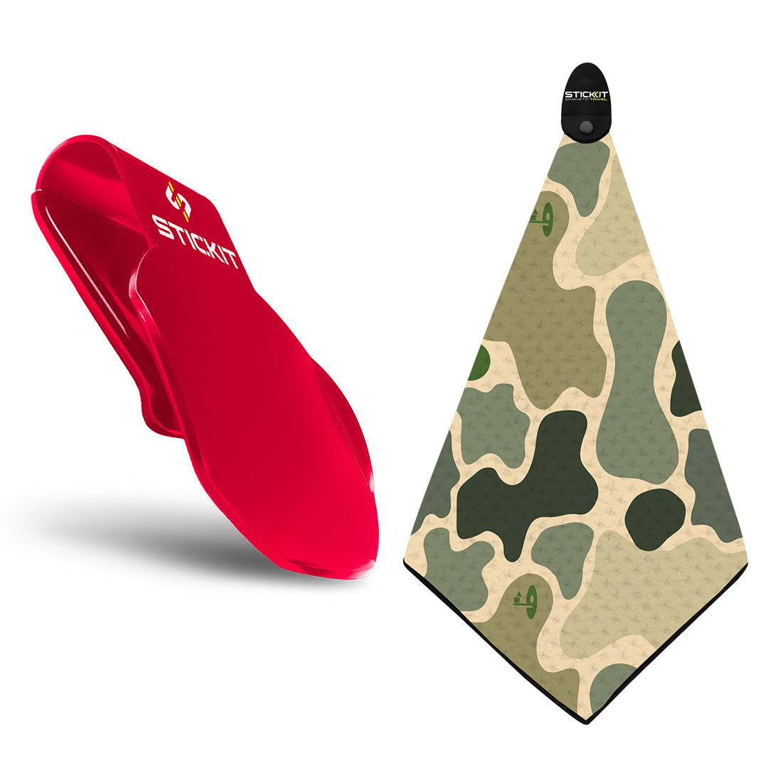 Red silicone stickit holder and camo-patterned microfiber towel in green and tan. Perfect for outdoor activities.