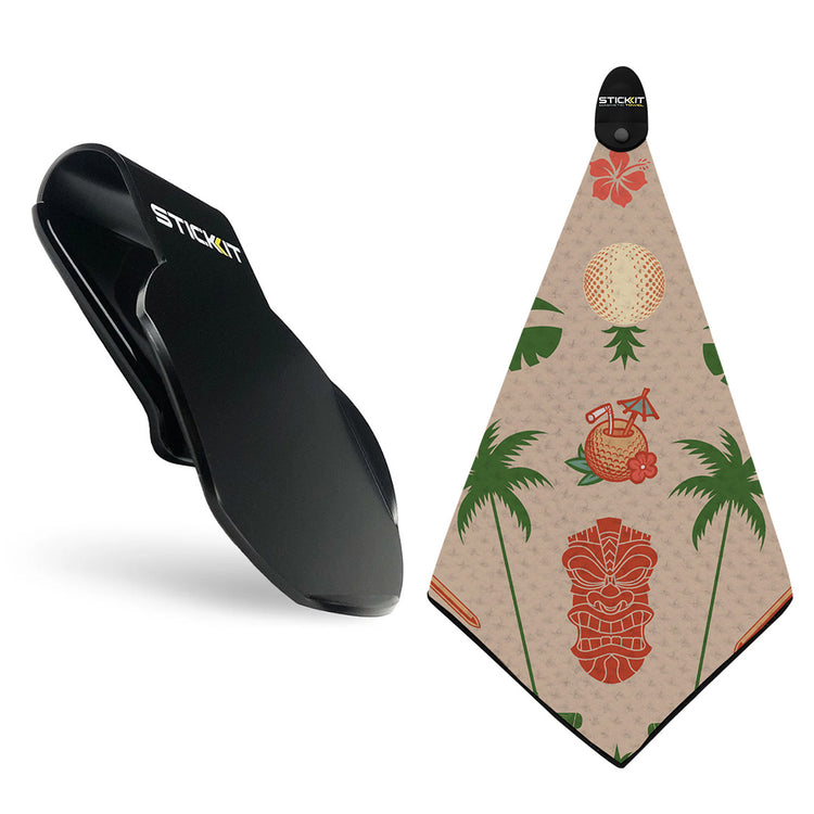 Black STICKIT golf towel clip with beige golf towel featuring tropical tiki and palm tree designs. Perfect for golf enthusiasts.