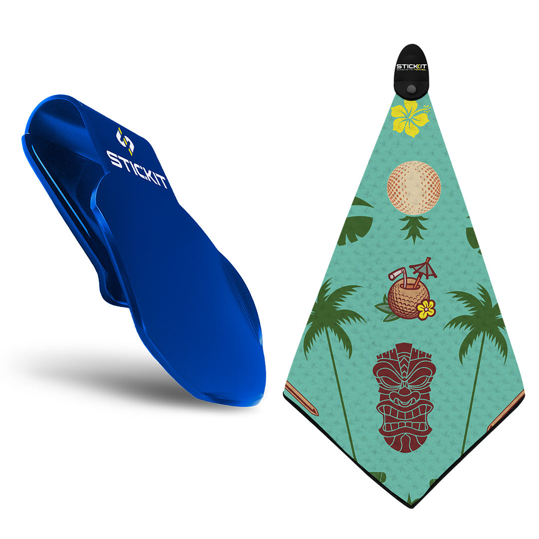 Blue silicone golf towel holder with a tropical green towel featuring baseball and tiki designs.