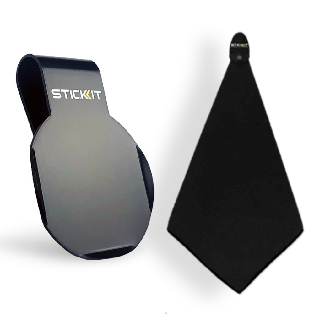 Black STICKIT multifunctional adhesive holder and microfiber cleaning cloth set for easy gadget organization.