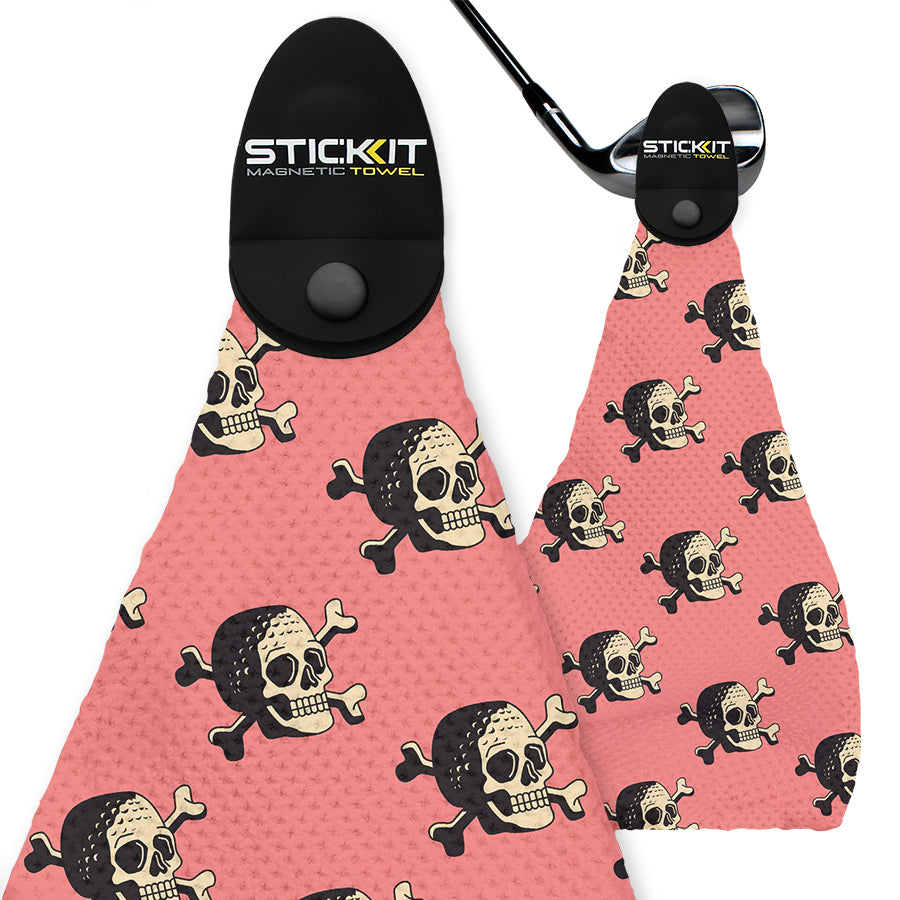 Pink skull and crossbones magnetic golf towel, durable microfiber material, stylish design for golf enthusiasts.