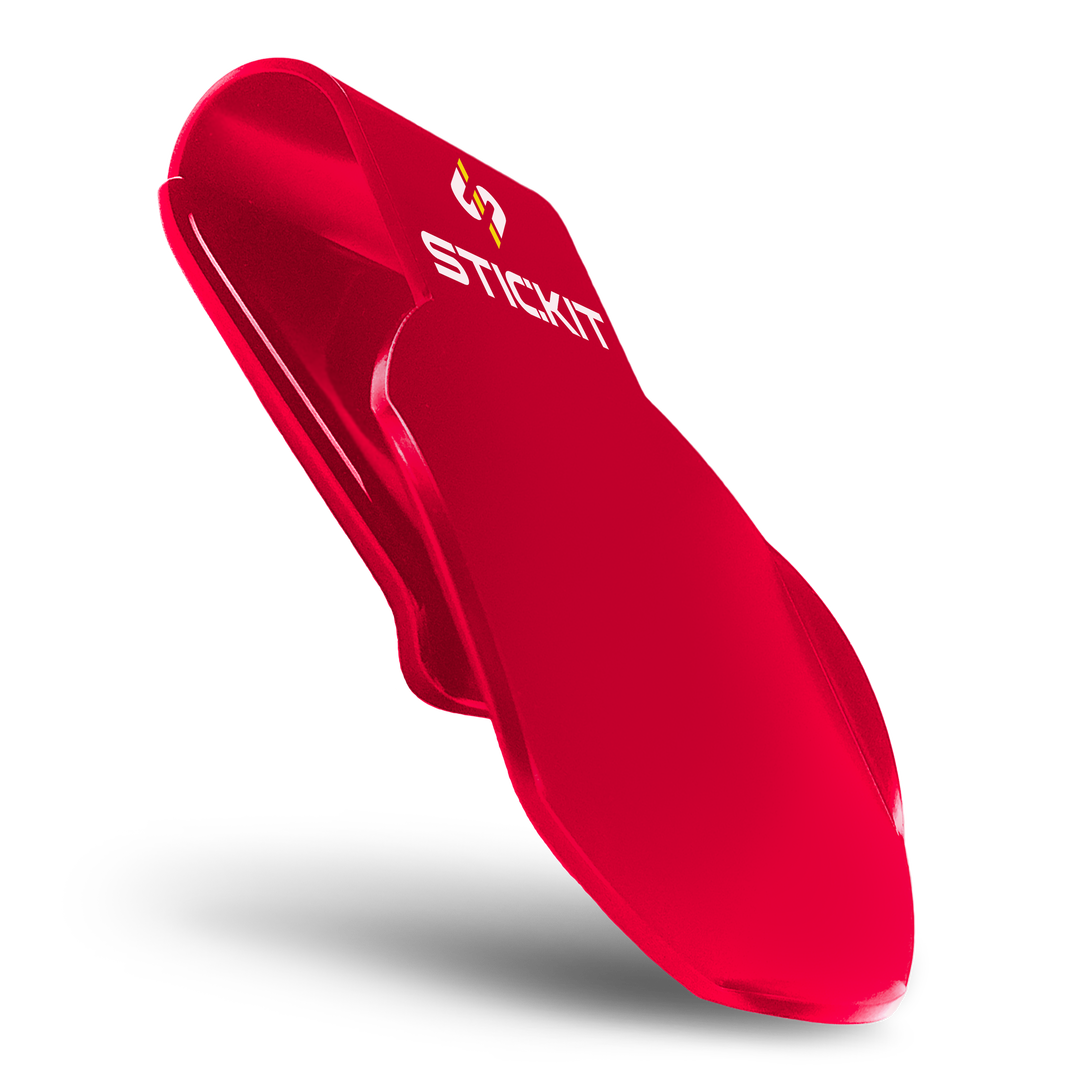 Bright red Stickit clip, made from durable plastic, featuring a sleek, modern design for secure and convenient use.