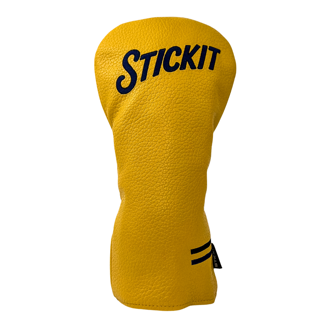 Yellow leather golf club headcover with black "STICKIT" logo and striped detailing. Perfect for stylish protection.