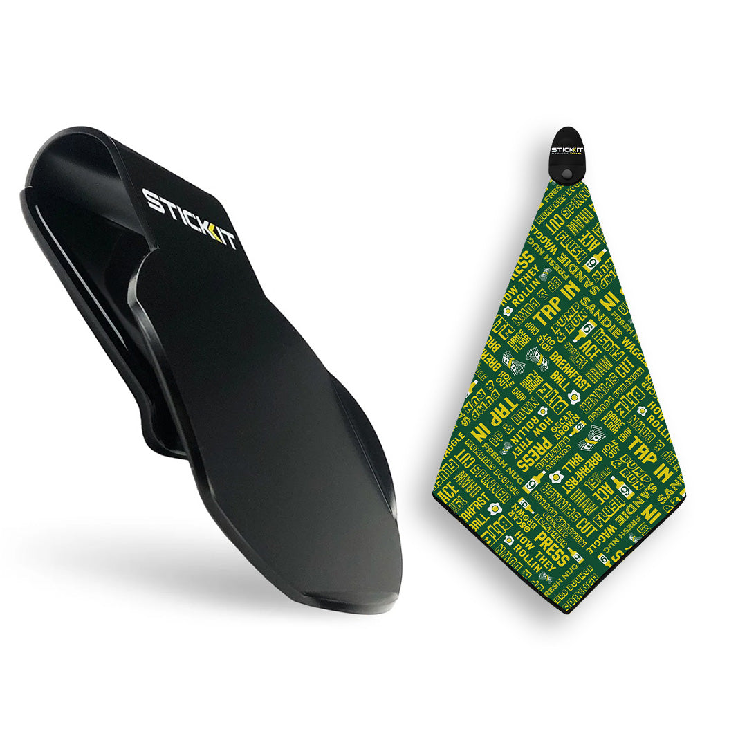 Black Stickit grip with a green and yellow patterned microfiber towel featuring motivational text. Perfect for workouts.