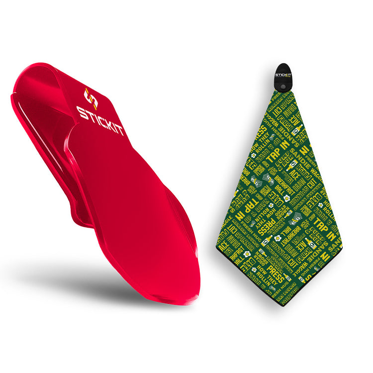 Red silicone mounting device with a green patterned cloth, featuring various press and graphic designs.