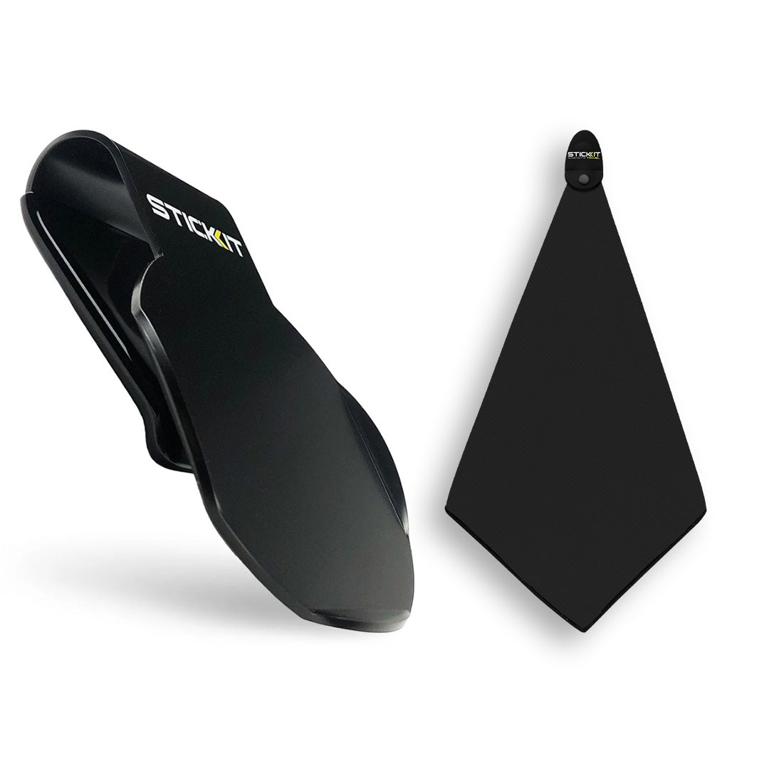 Black silicone phone holder with a sleek design and strong adhesive for secure mounting on surfaces.