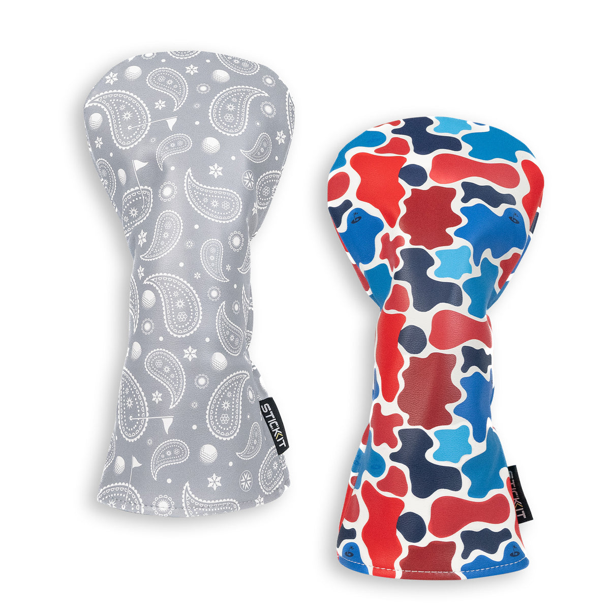 Set of two oven mitts: one gray paisley design and one colorful red, blue, and white abstract pattern, cotton material.