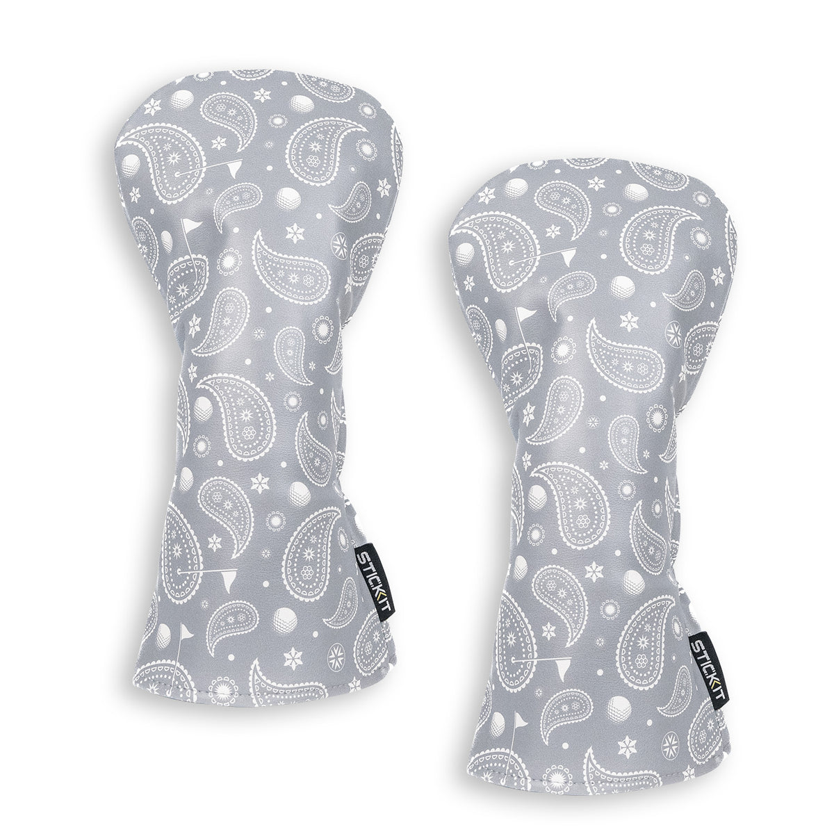 Gray paisley-patterned fingerless gloves, soft fabric, stylish design for a trendy winter look.