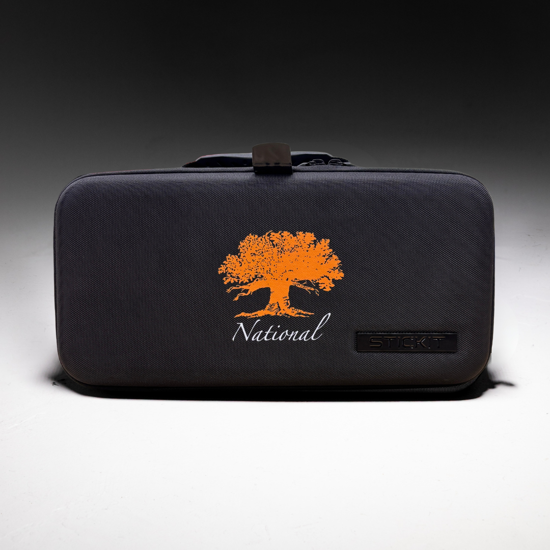 Gray storage case with an orange tree logo and "National" text, made of durable fabric, slim design.