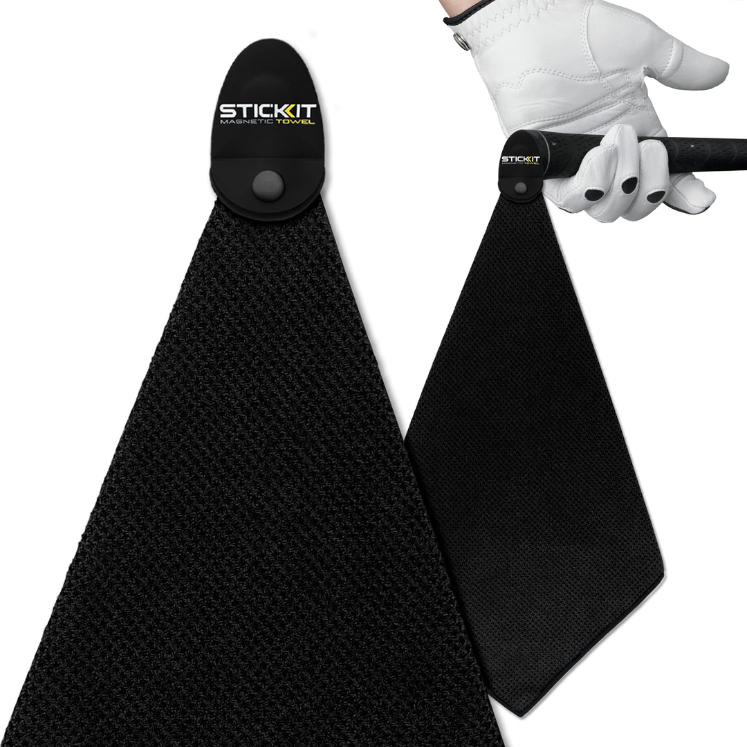 Black microfiber golf towel with magnetic clip, perfect for on-course convenience and quick drying.