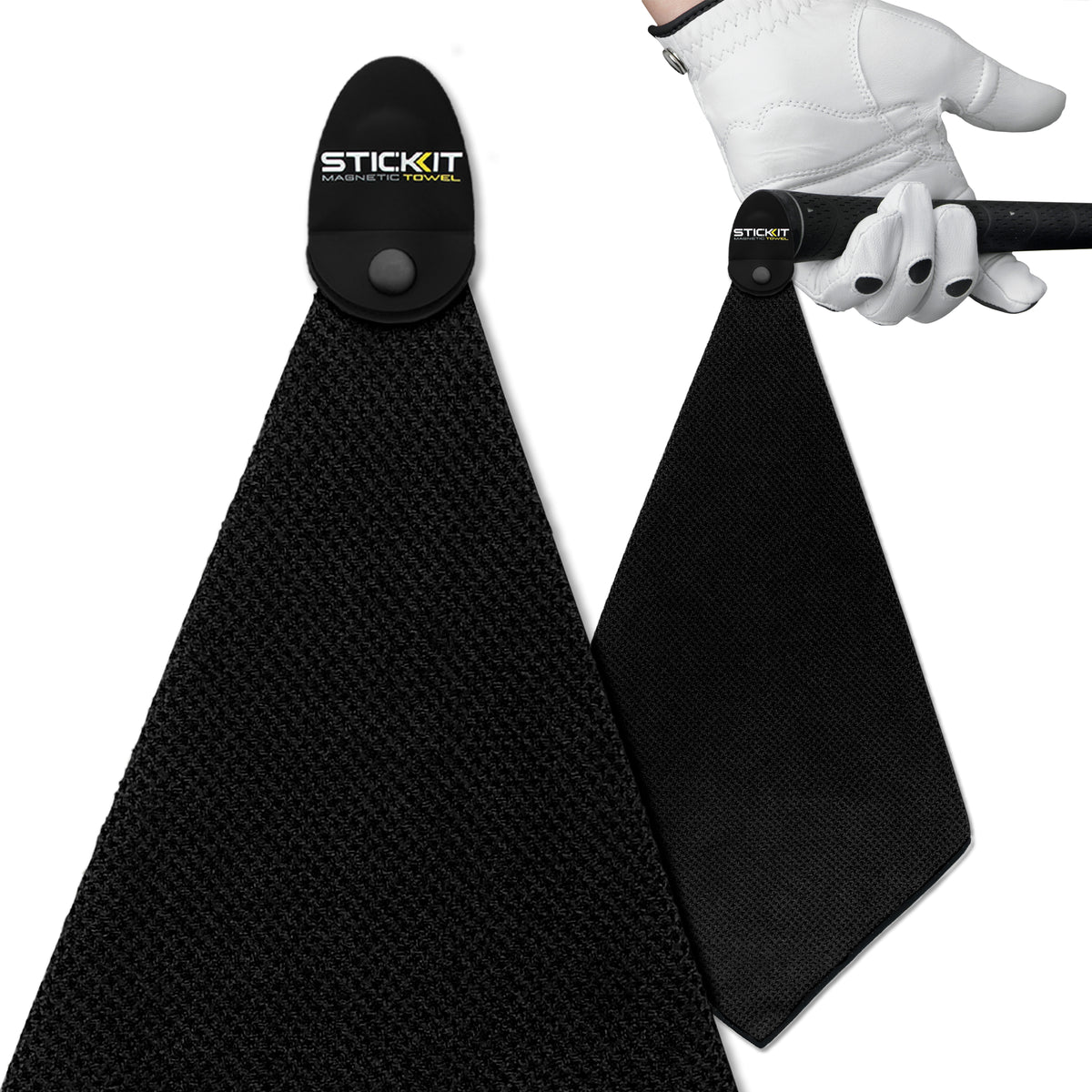Black microfiber golf towel with magnetic clip, perfect for on-course convenience and quick drying.