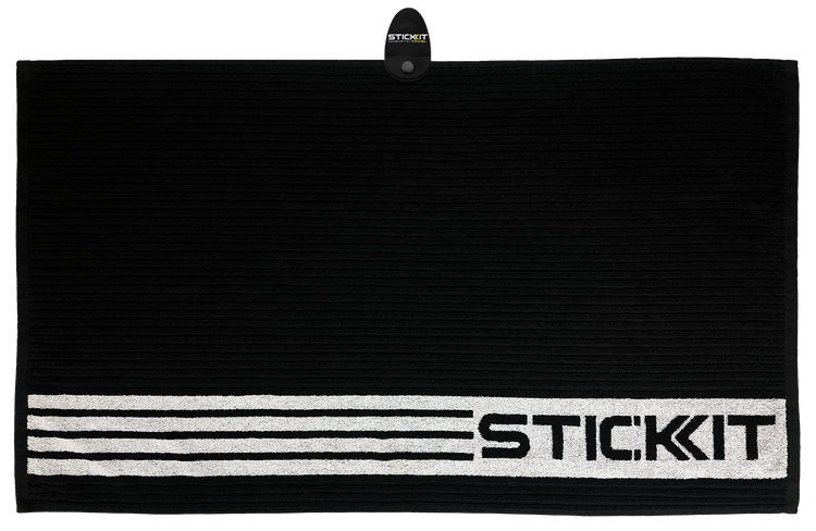 Black textured towel with white STICKIT branding, made from absorbent fabric, ideal for gym or sports use.