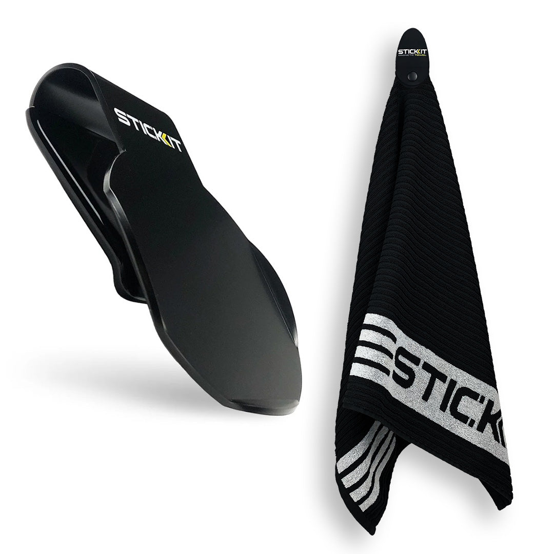 Black Stickit towel holder with a black and white striped microfiber towel, stylish and functional for active lifestyles.