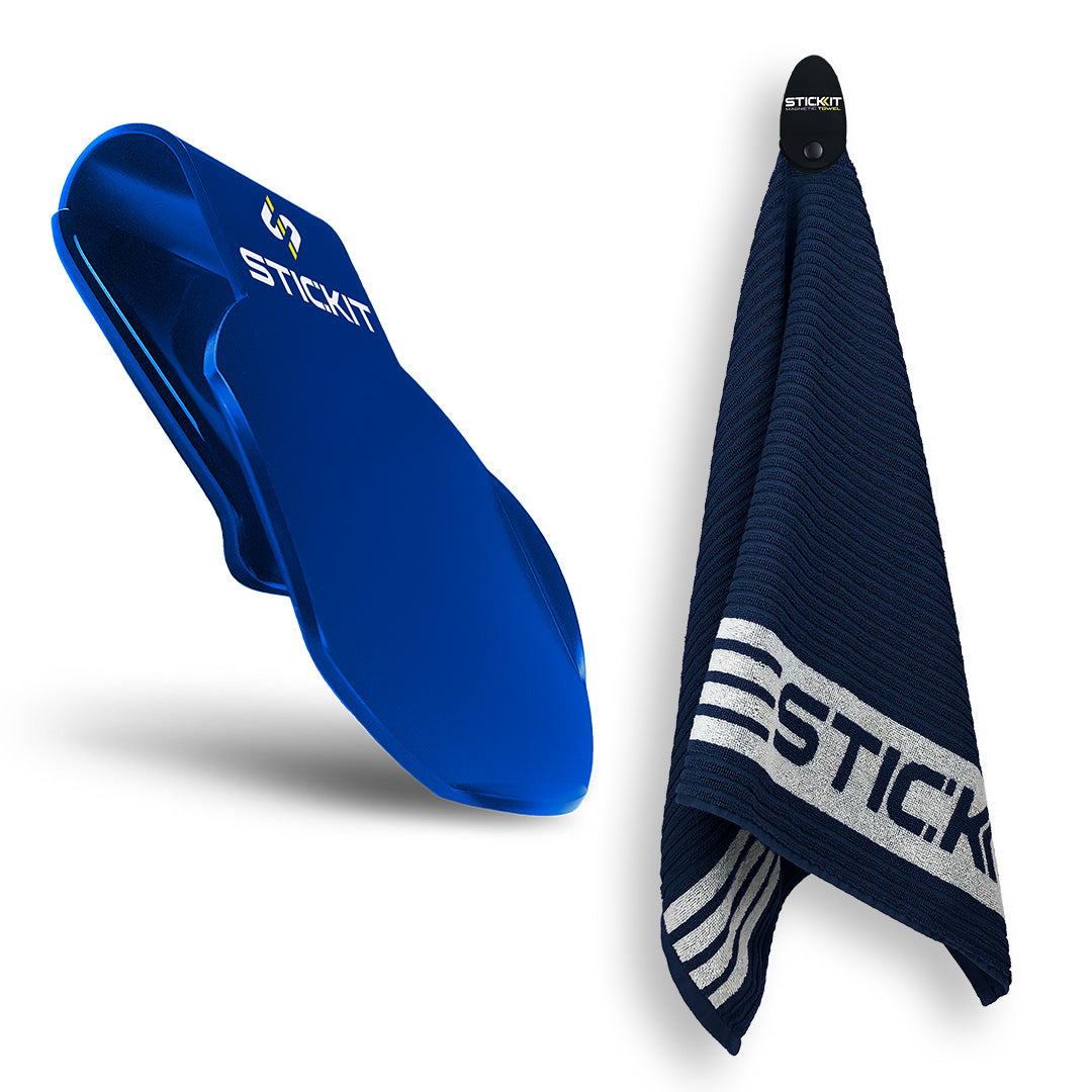 Blue silicone towel clip with a hanging navy and white striped towel, ideal for gym or athletic use.