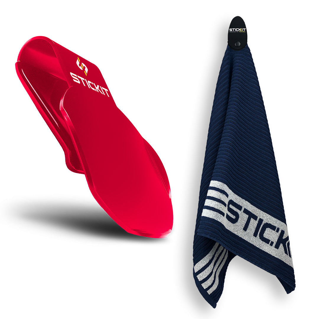 Red Stickit grip pad and navy towel, designed for optimal performance and durability in sports activities.
