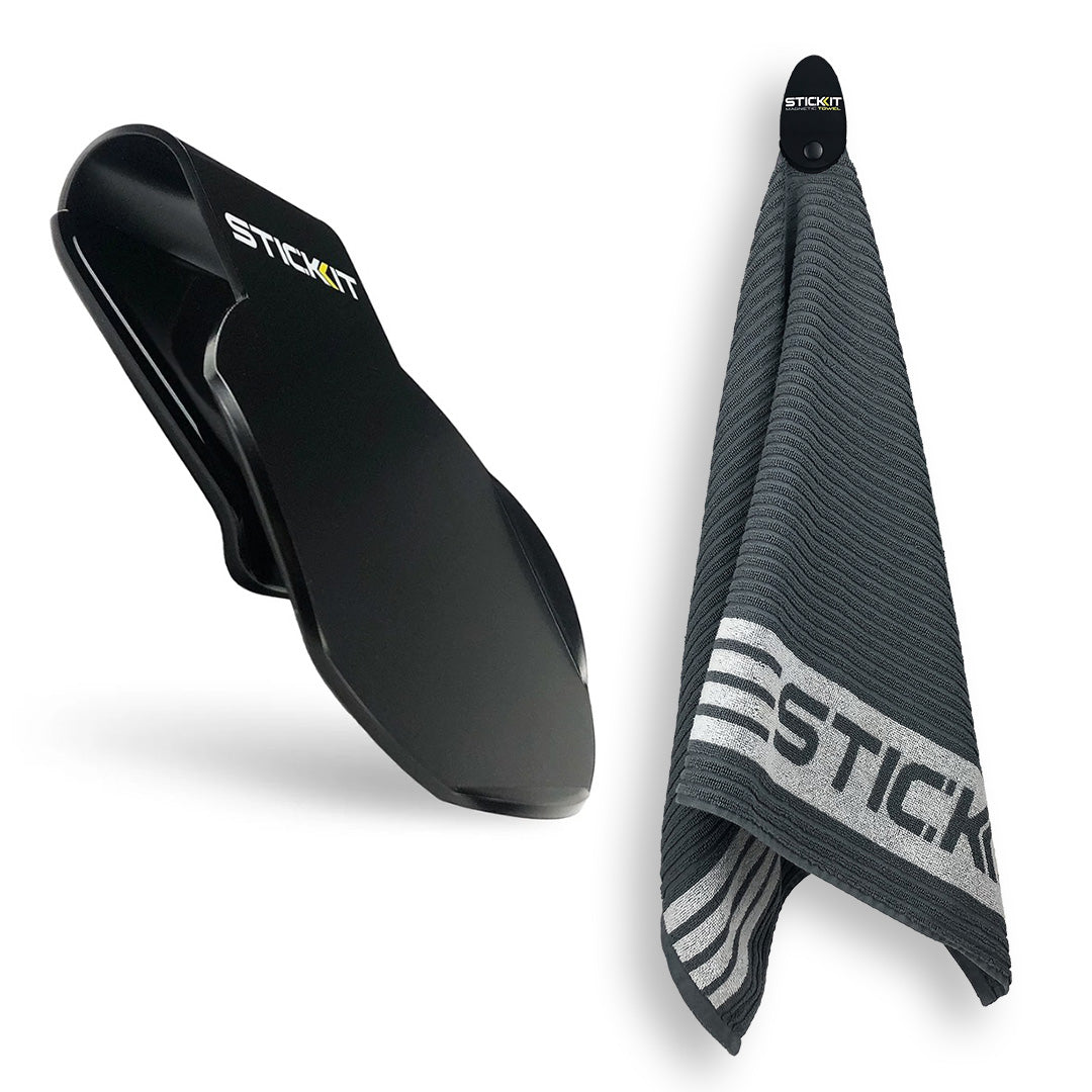 Black STICKIT towel holder with gray and white striped towel, perfect for gym or sports use, durable and stylish.
