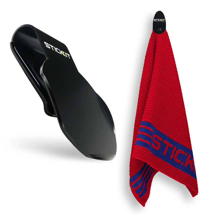 Black STICKIT towel clip with red towel featuring blue stripes, perfect for gym or sports use.