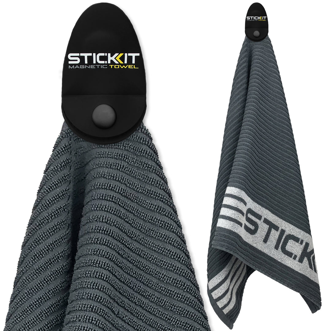 Gray magnetic towel with textured fabric and black holder, featuring the STICKIT logo for easy hanging.