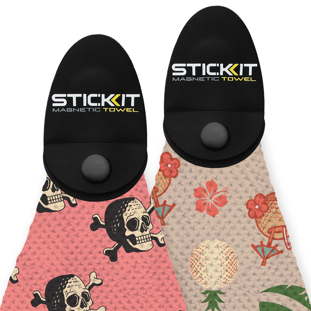 Magnetic towel set, featuring a pink skull design and a floral print, durable fabric, sleek black holders.