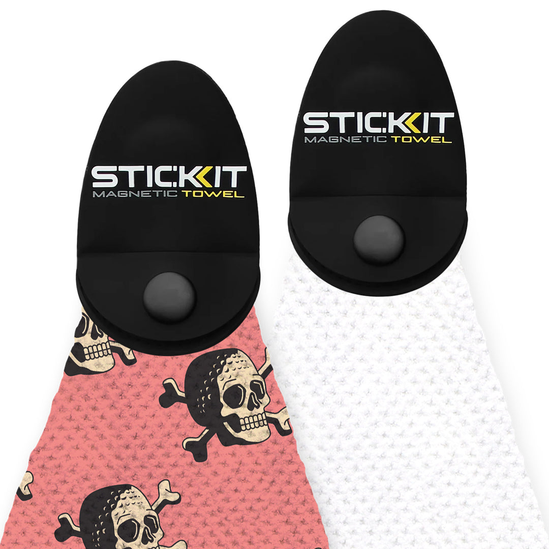 Magnetic towels in pink and white with skull prints, featuring a durable black holder for easy attachment.