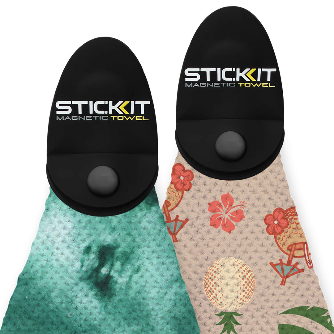 Black magnetic towel holder with green and beige-patterned microfiber towels, featuring tropical and floral designs.