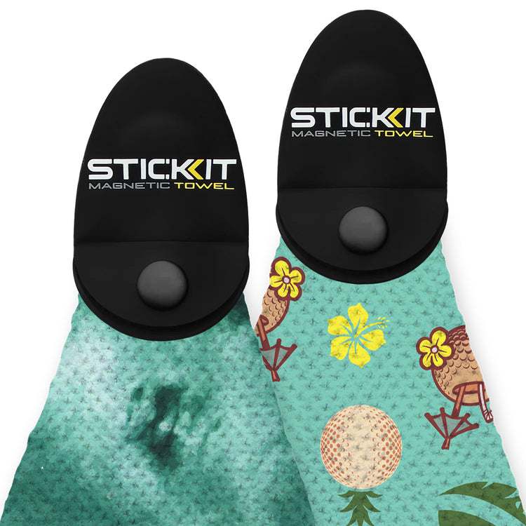 Black magnetic towel holder with teal Hawaiian print microfiber towel featuring tropical patterns and vibrant colors.