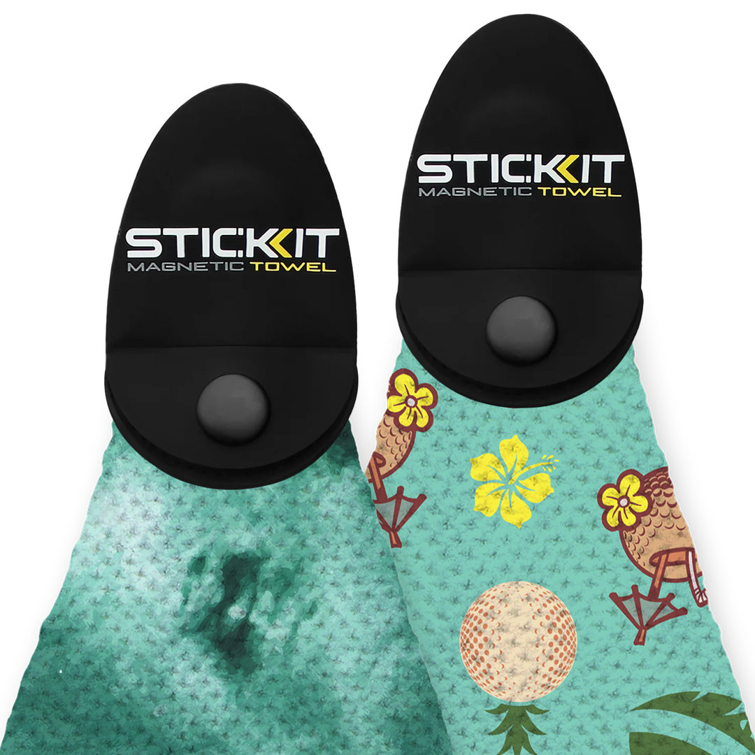 Black magnetic towel holder with teal Hawaiian print microfiber towel featuring tropical patterns and vibrant colors.