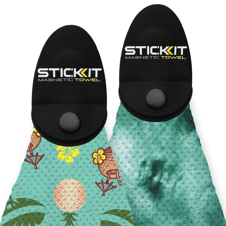 "STIC KIT magnetic towel in teal with tropical print and black magnetic holder, perfect for beach or gym use."