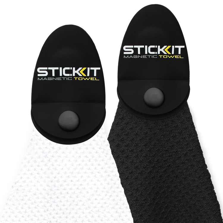 Magnetic towel set in black and white, featuring a durable, textured fabric and innovative stick-on design.