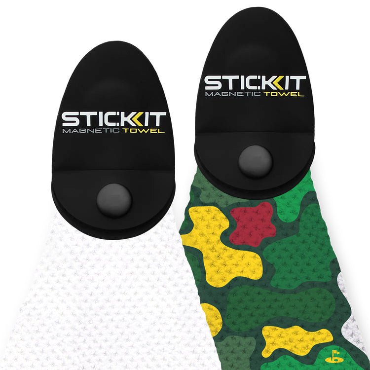 Black and white STICK:KIT magnetic towel with a camo print design featuring yellow and green accents.