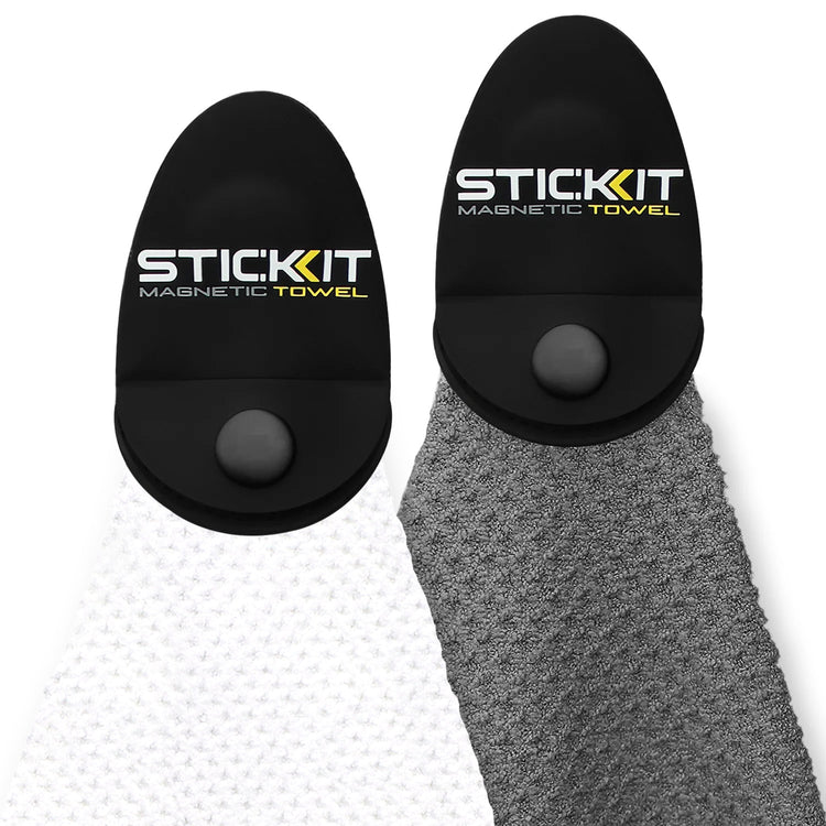 Black and gray STIC KIT magnetic towels with textured fabric and rounded clips for easy attachment and storage.