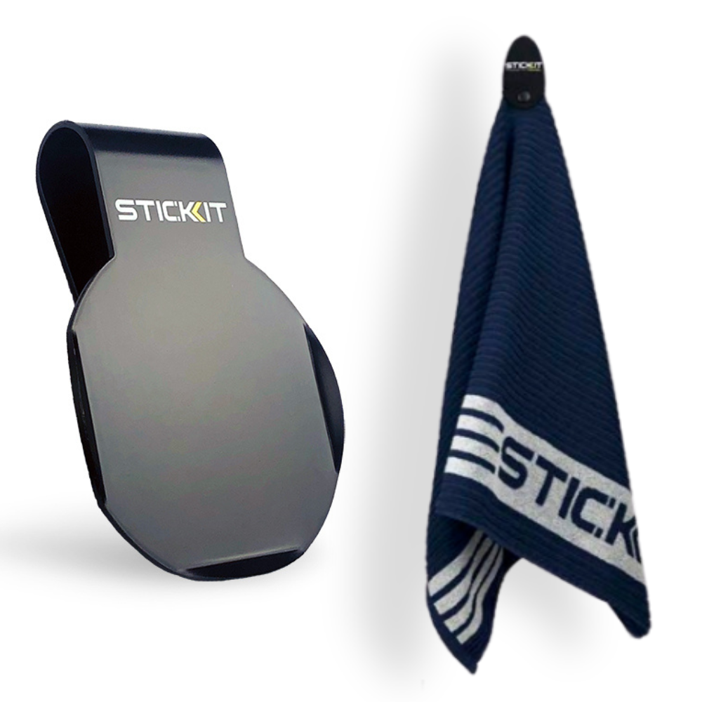 Black STICKIT towel holder with navy and white striped microfiber towel, perfect for gym or outdoor use.