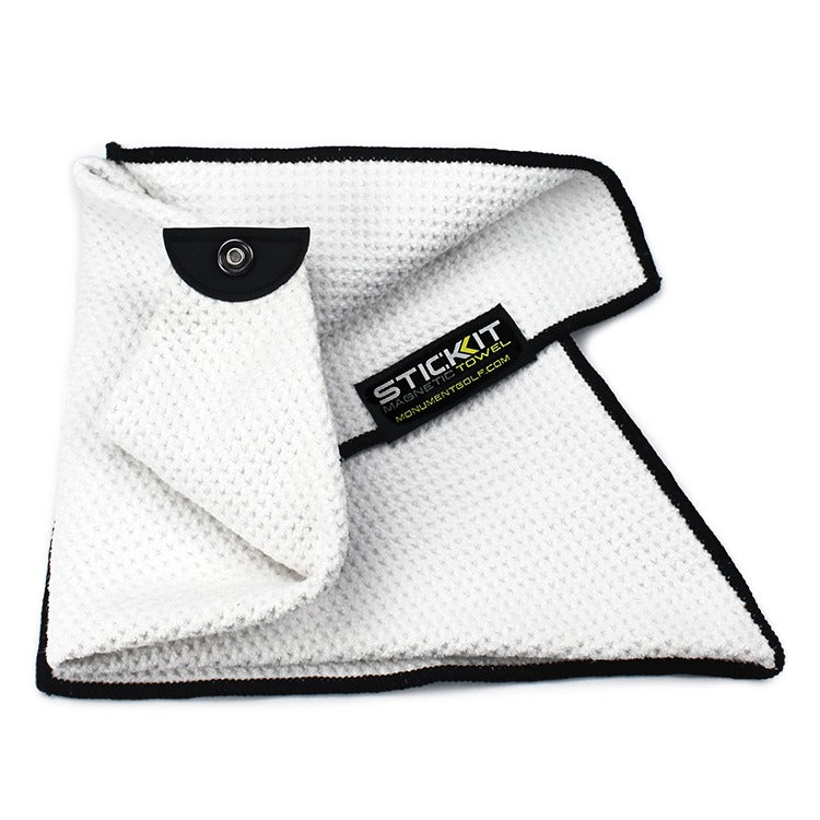 White waffle-patterned microfiber towel with black trim and snap button for easy attachment. Ideal for cleaning and drying.