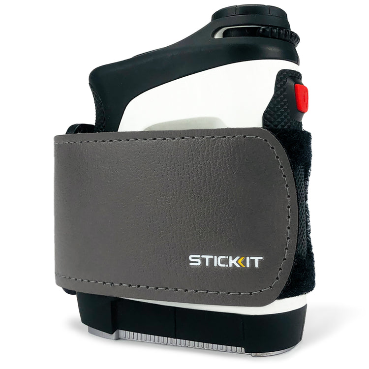 Black and white handheld spray adhesive with a gray leather holder, designed for easy grip and precision application.