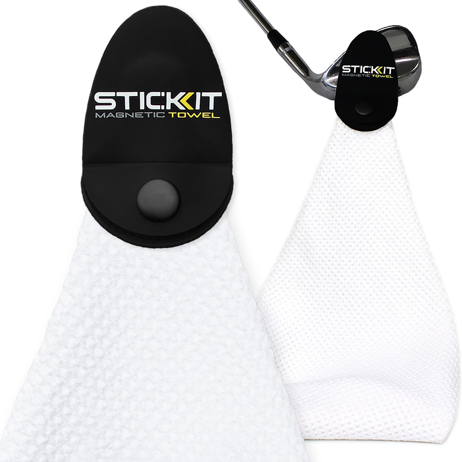 White magnetic golf towel with a sleek black holder, ideal for on-course use and easy attachment to clubs.